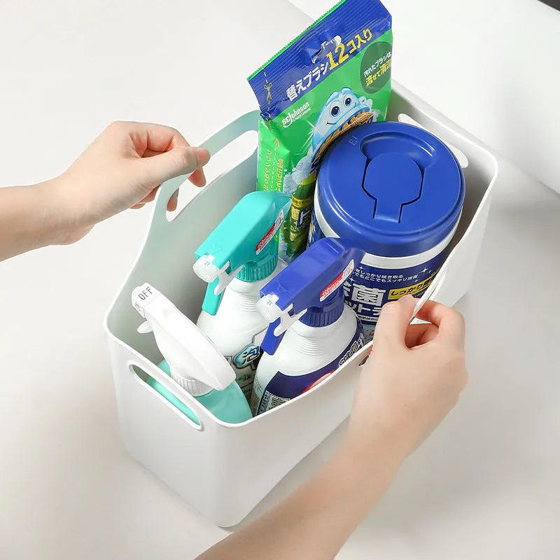 White PE plastic laundry detergent storage box with handle on a clean surface