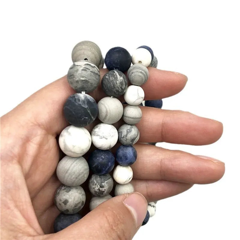 Universe Wind planet stone bracelet showing 10mm natural stone bead on adjustable hand-tied cord