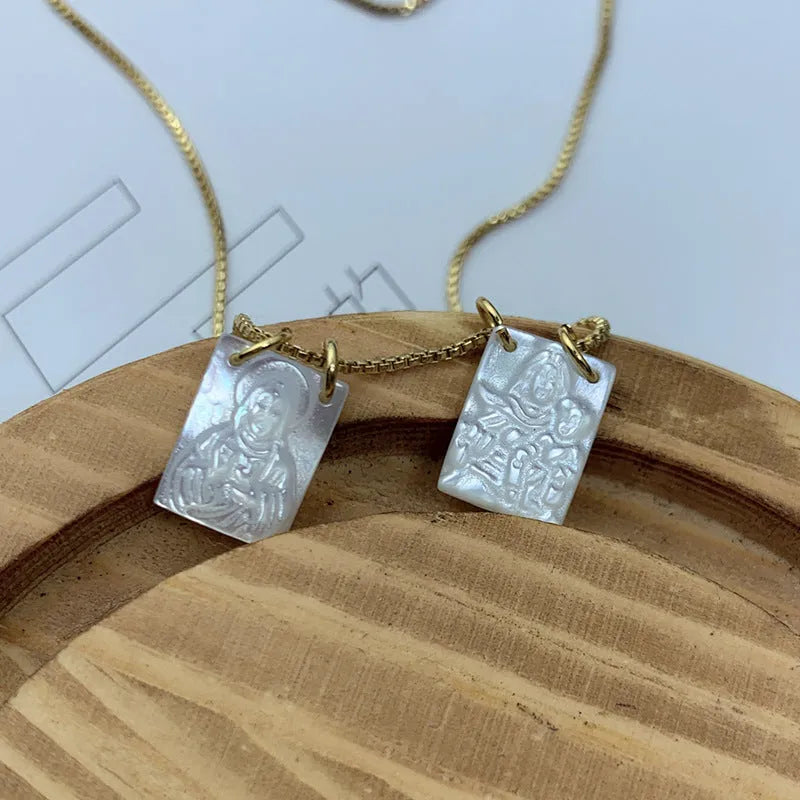 White mother pearl shellfish Jesus Virgin Mary pendant on a 45cm alloy box chain with electroplated white finish