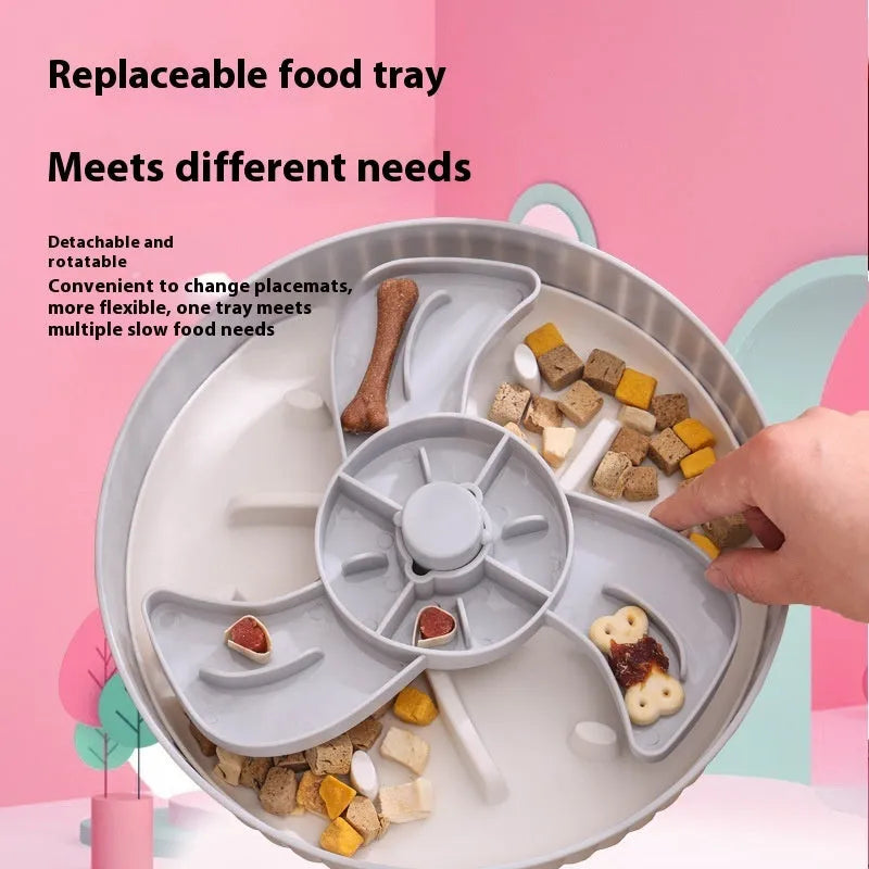 A rotating plastic pet feeding game board with an anti-choke pad and a detachable silicone licking mat in a windmill pattern.
