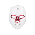 Rechargeable LED beauty mask with touch controls in white and black colour options on a table.