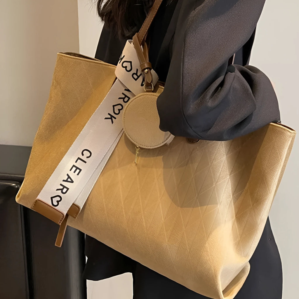 Casual large capacity shoulder bag in horizontal square shape with zippered interior compartment