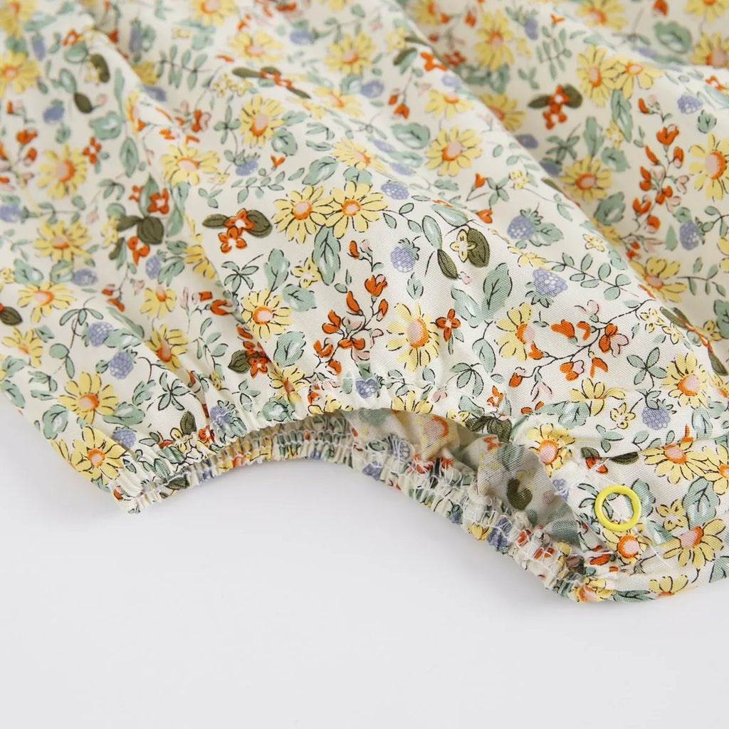 Yellow floral cotton baby romper with doll collar for girls, triangle jumpsuit style