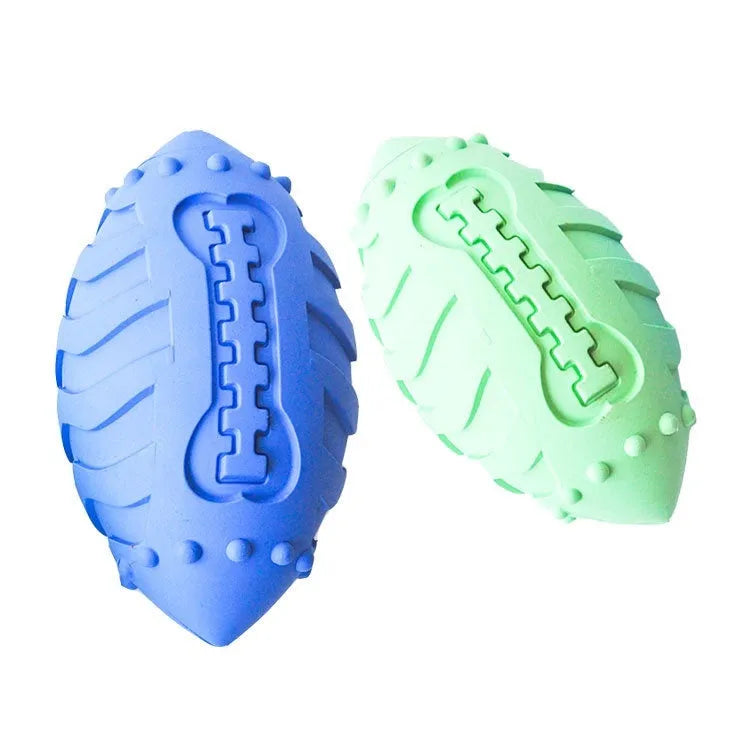 Light green bite-resistant rubber rugby ball dog toy with textured surface for teeth cleaning