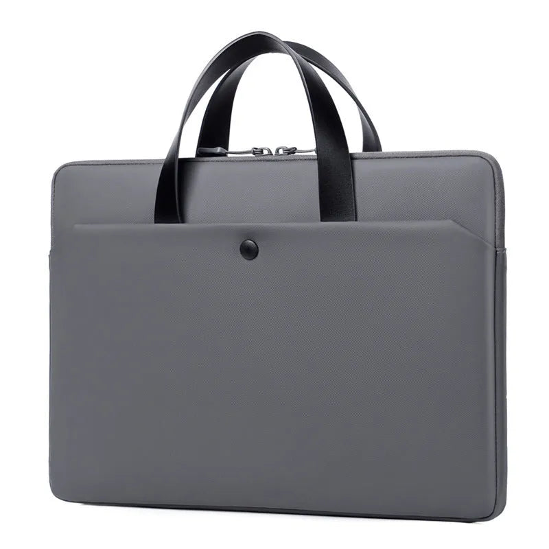 Ultra-thin leather laptop case in light grey with zipper closure and soft handle for 14 inch devices
