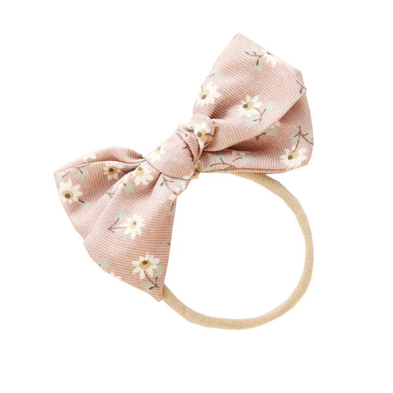 Children's knotted bow hair ring with fabric construction and printed patterns
