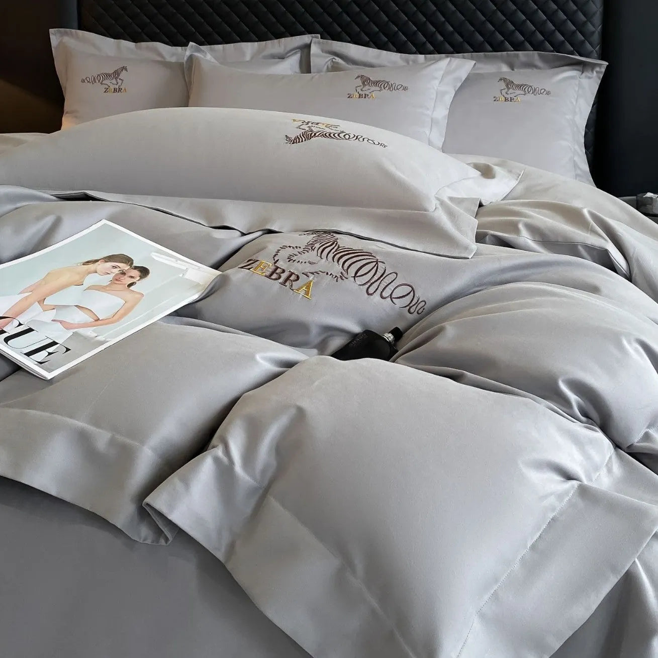 Solid colour pure cotton four-piece bedding set with light brushed finish on a bed in a modern bedroom
