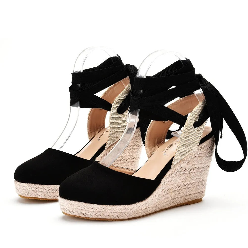 Women's bohemian wedge sandals with beaded details and a buckle strap.