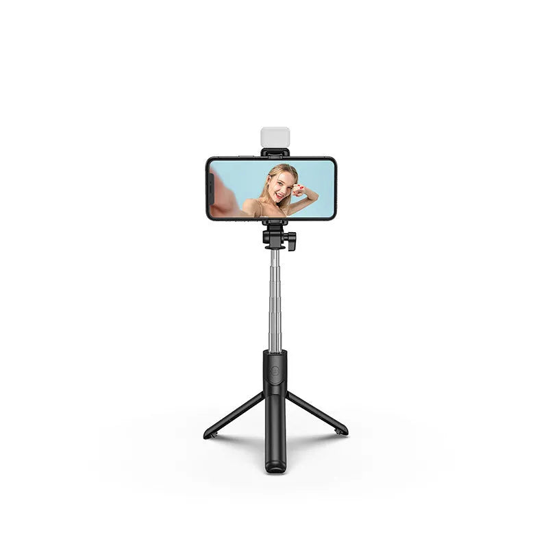 Aluminium alloy Bluetooth selfie stick with integrated tripod legs and 360-degree rotating phone holder in black.