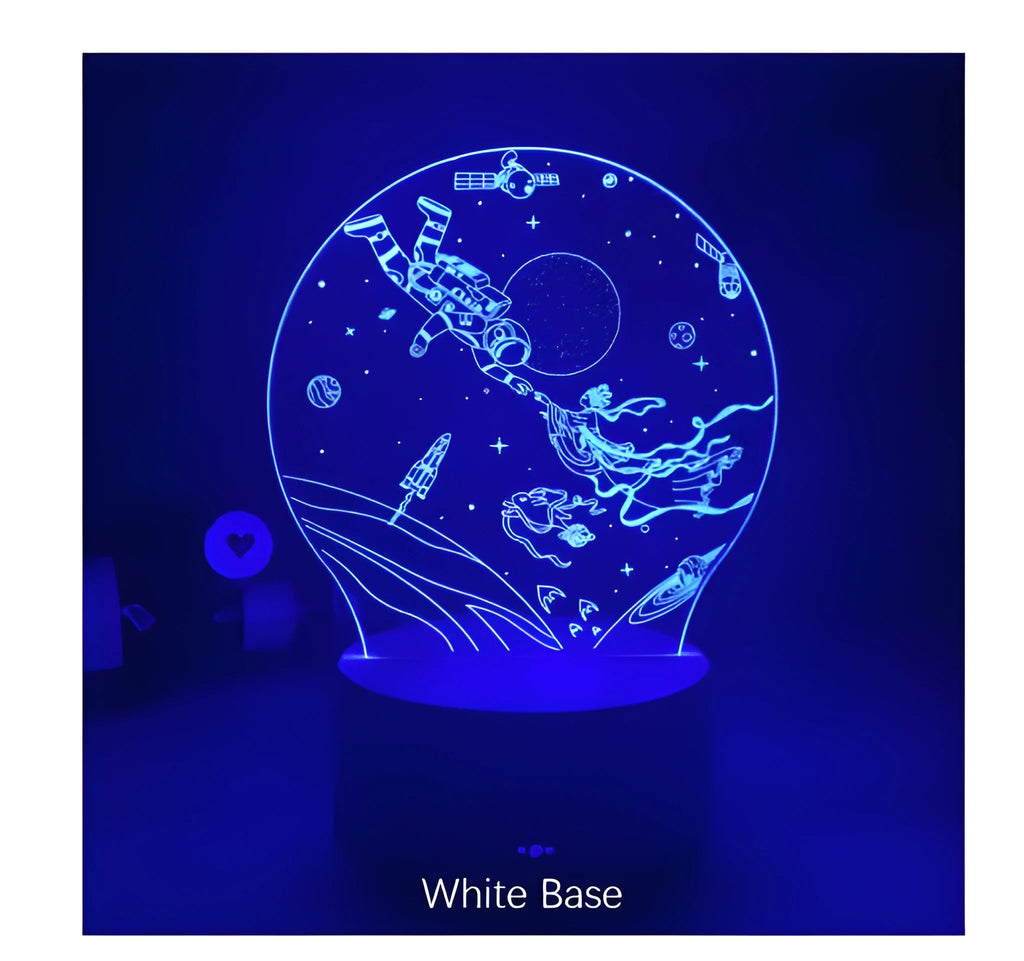 Colourful 3D night light in black base with remote control showing green glow on dark surface