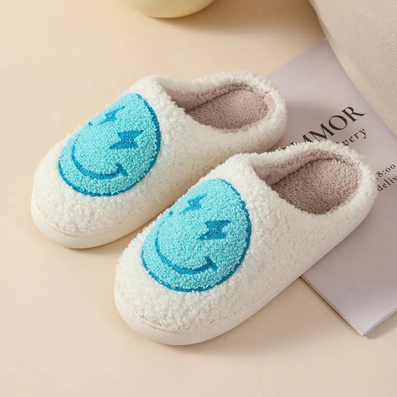 Women's plush cartoon-style home slippers with a round toe and PVC sole.