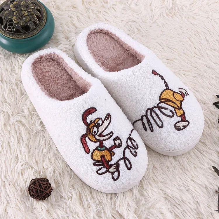 White cartoon pattern plush toe holder slippers with a non-slip rubber sole.