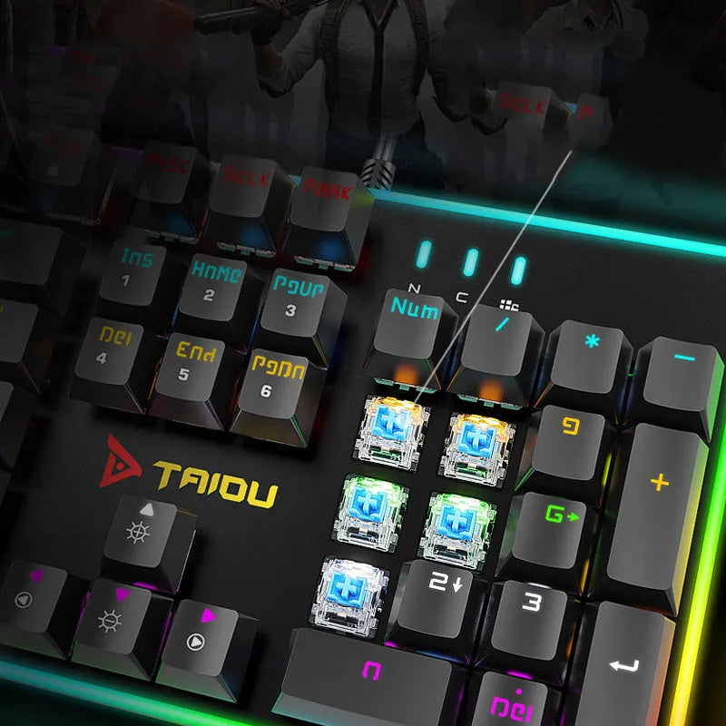 Real mechanical keyboard with RGB backlight, metal frame, 104 keys, and USB cable on a desk