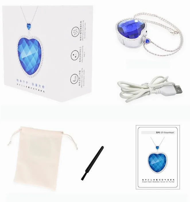 Wearable air freshener in blue heart colour with 304 stainless steel chain and crystal glass casing, showing anion release port