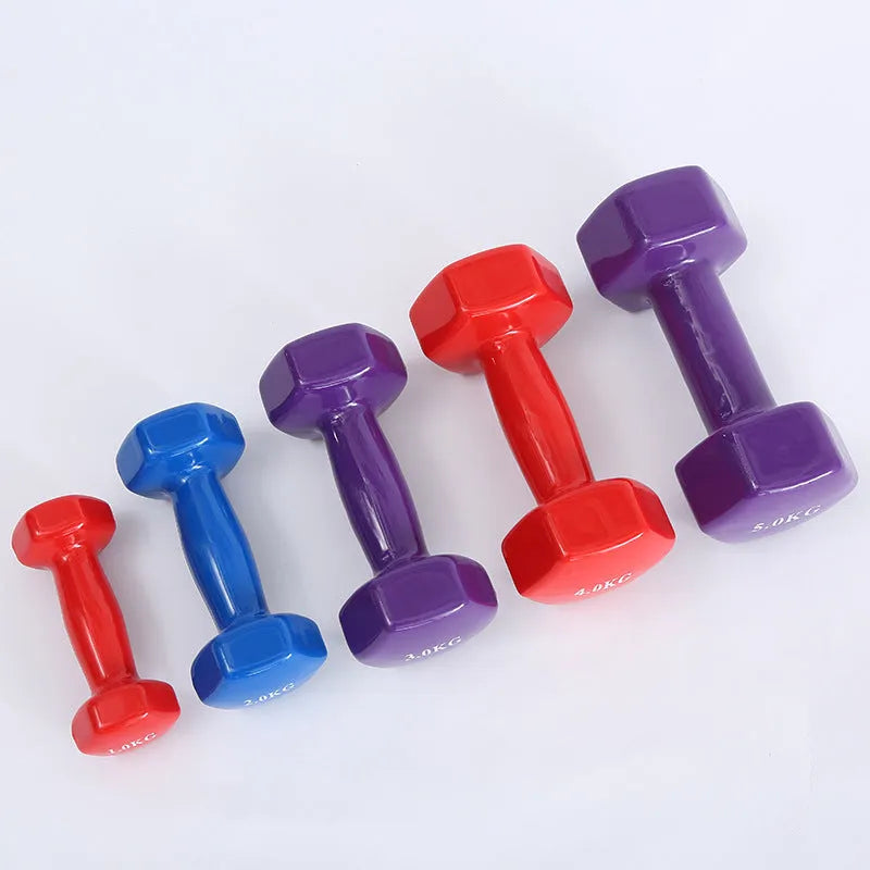 Colourful plastic-coated fitness dumbbells in bright colours showing 0.5kg, 1kg and 1.5kg weight options