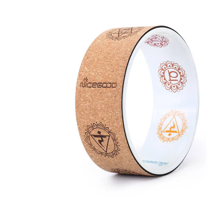 Cork yoga wheel 32cm diameter with natural cork surface and rubber edge, classic black colour