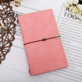 A6 diary notebook with cowhide rope design on imitation leather cover, showing wireless binding and available in grey, pink, or red colours