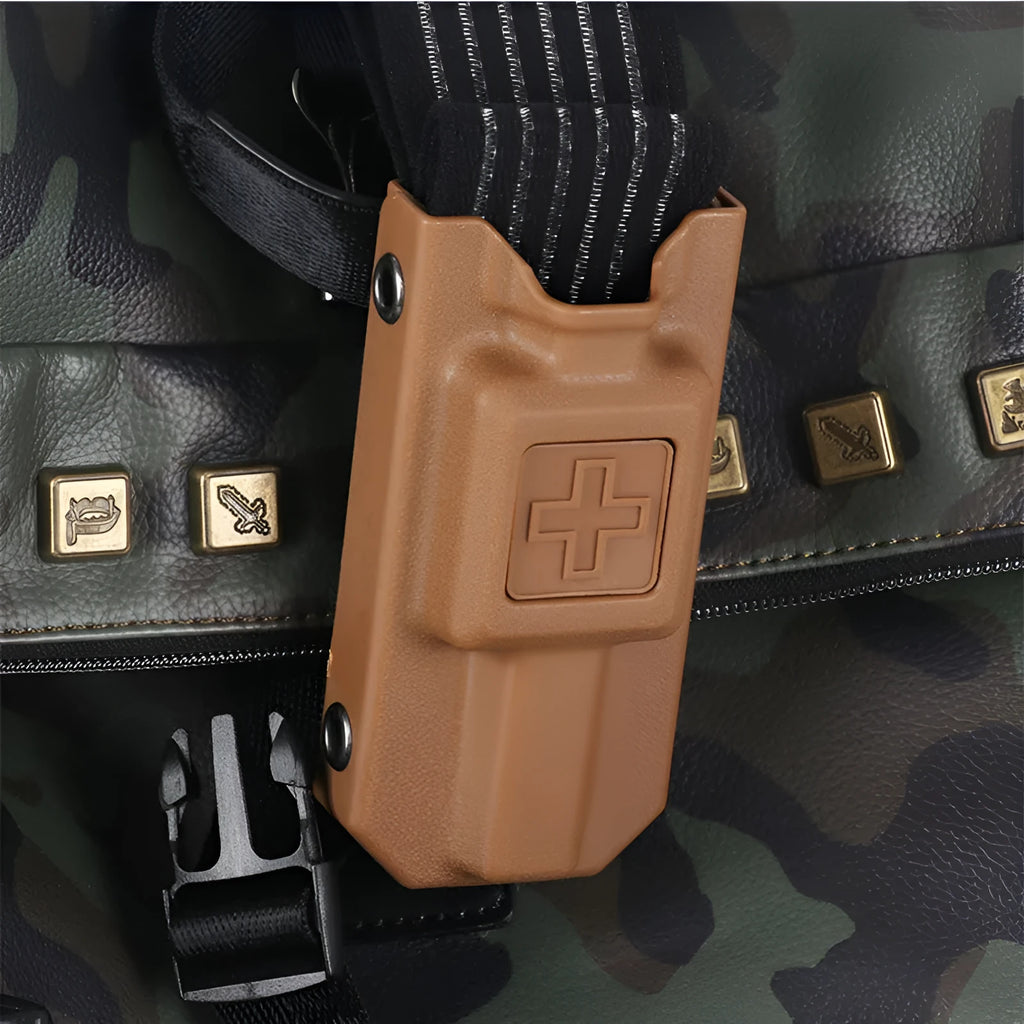 Plastic tourniquet training device in army green colour with a matching storage box.