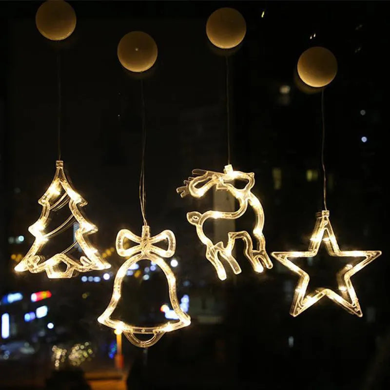 Battery-powered Christmas LED chandelier light with suction cups, showing Santa Claus design.
