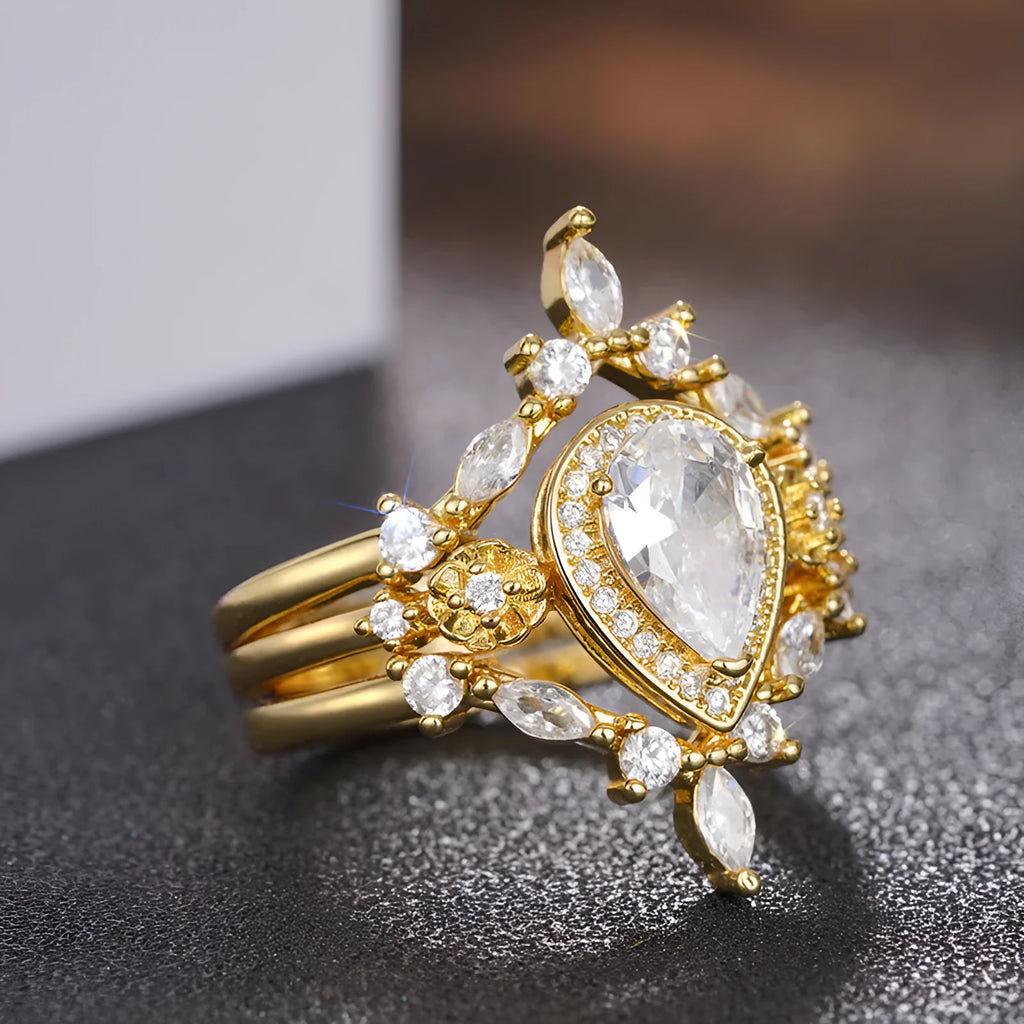 Women's light luxury drop-shaped zircon ring in T0541 yellow gold finish, copper base, geometric water droplet design