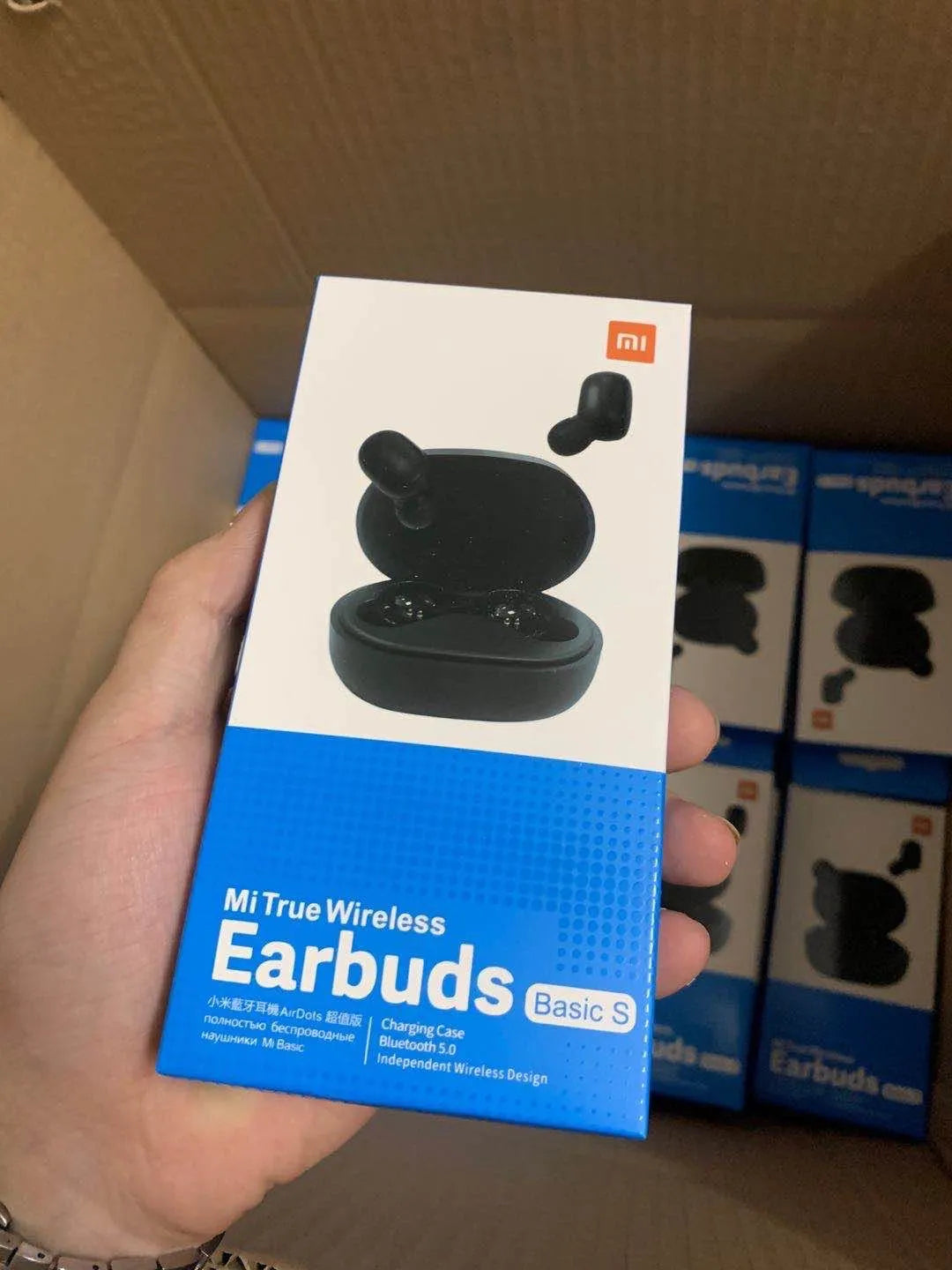Redmi AirDots 2 black true wireless earbuds and charging case on a white background