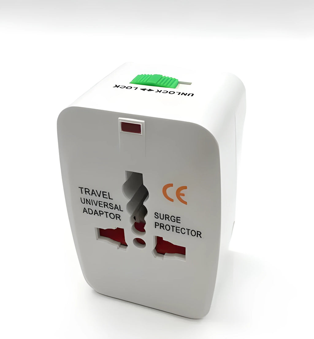 Compact white universal travel plug adapter and charger converter on a grey background.
