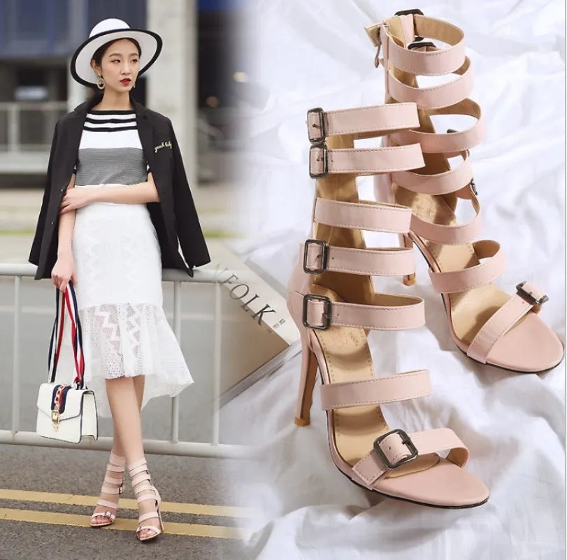 Women's high tube belt buckle high heel sandals in black with Roman boot style and ankle strap