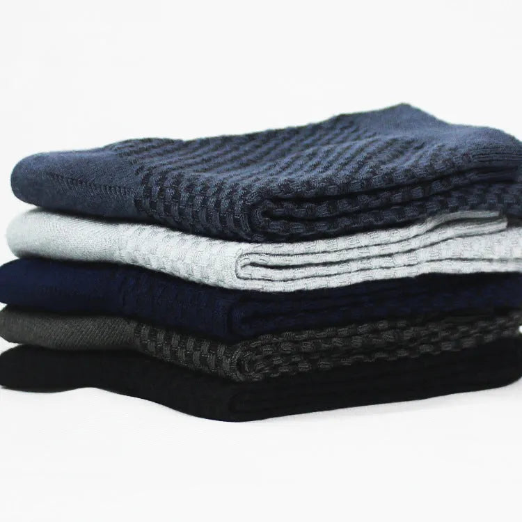 Pair of men's bamboo fibre business socks with small square pattern, shown in navy blue.