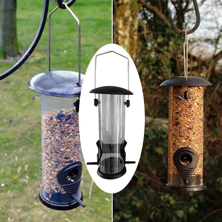 Black hanging bird feeder with transparent case, metal top and bottom, side feeding holes, and top hanging ring, 21.5x11x13cm