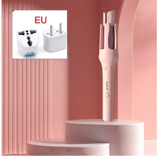 White and Chigo brand automatic hair curler with a 32mm barrel on a table.