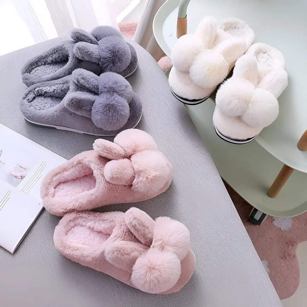 Women's fluffy rabbit fur slippers with floral pattern, high upper, and low heel in multiple colours.