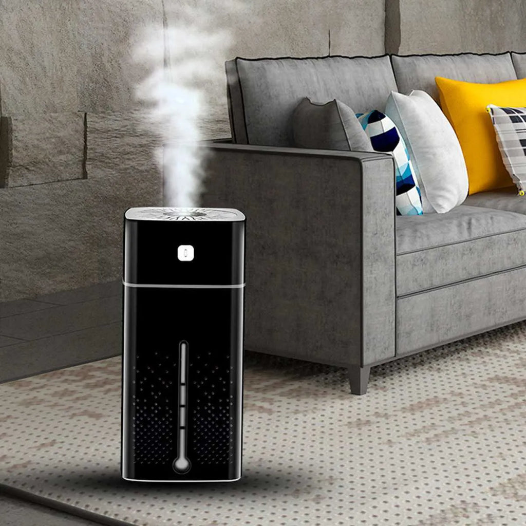 Black or white desktop ultrasonic humidifier with 1000ml tank and USB cable on a wooden desk.