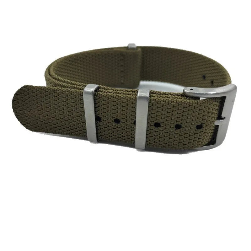 Nylon integrated watch strap in army green colour showing textile weave and buckle.