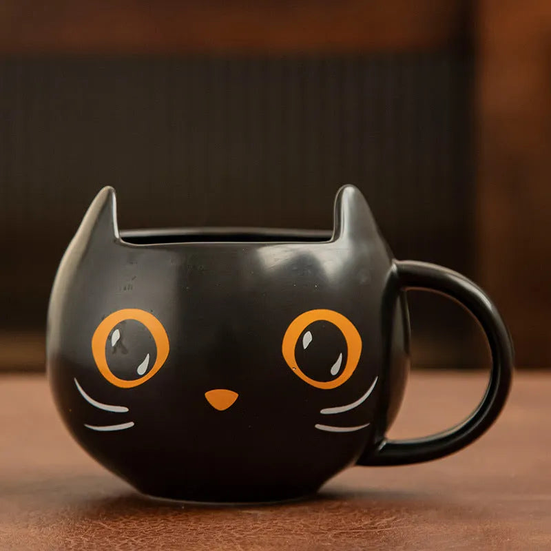 Black ceramic cat mug with pumpkin and spoon couple illustration, 355ml capacity