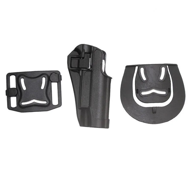 Black plastic tactical holster on plain background for duty carry use