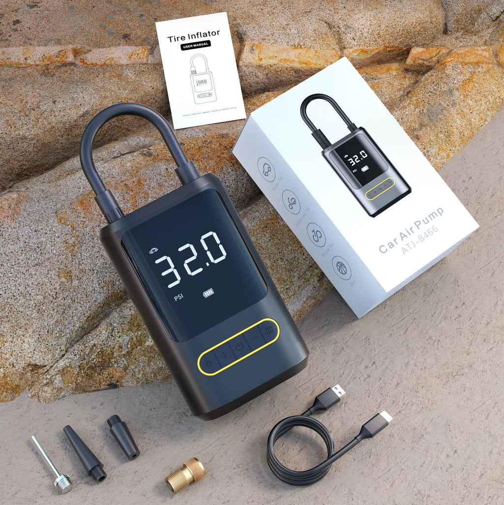 Handheld wireless digital display car air pump with LED light on black ABS body.