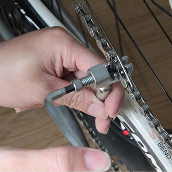 Set of four stainless steel bicycle repair multi-tools including TT2543, TT2536 gold, TT2536 black, and TT2552 9-function