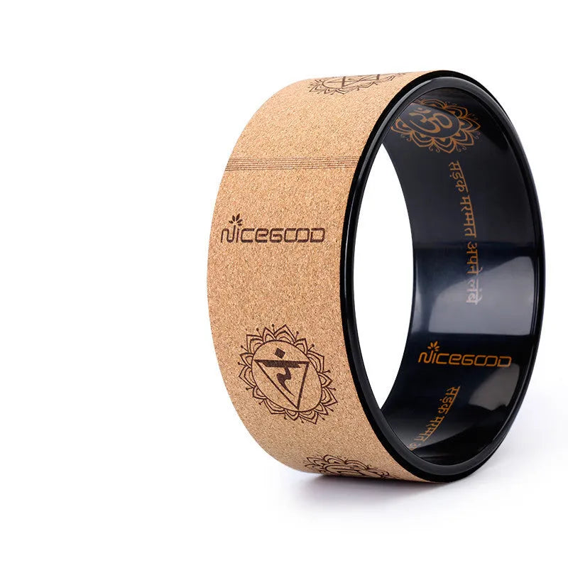 Cork yoga wheel 32cm diameter with natural cork surface and rubber edge, classic black colour