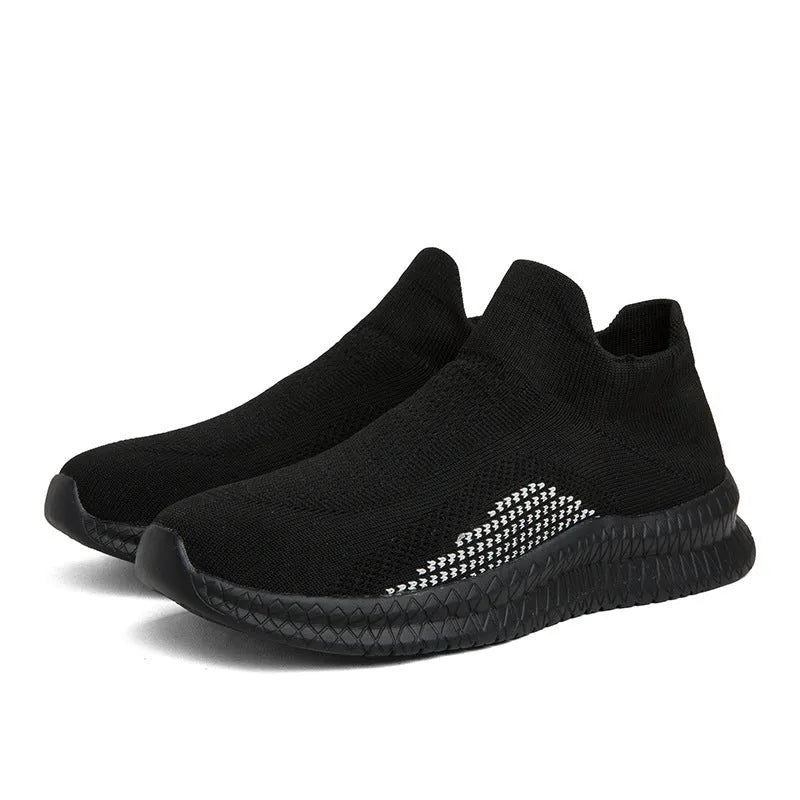 Men's white popcorn flyknit fabric low-top casual sneakers on a plain background.