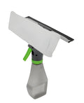 3-in-1 handheld car cleaning brush with spray bottle, microfibre cloth, and silicone squeegee on a glass surface