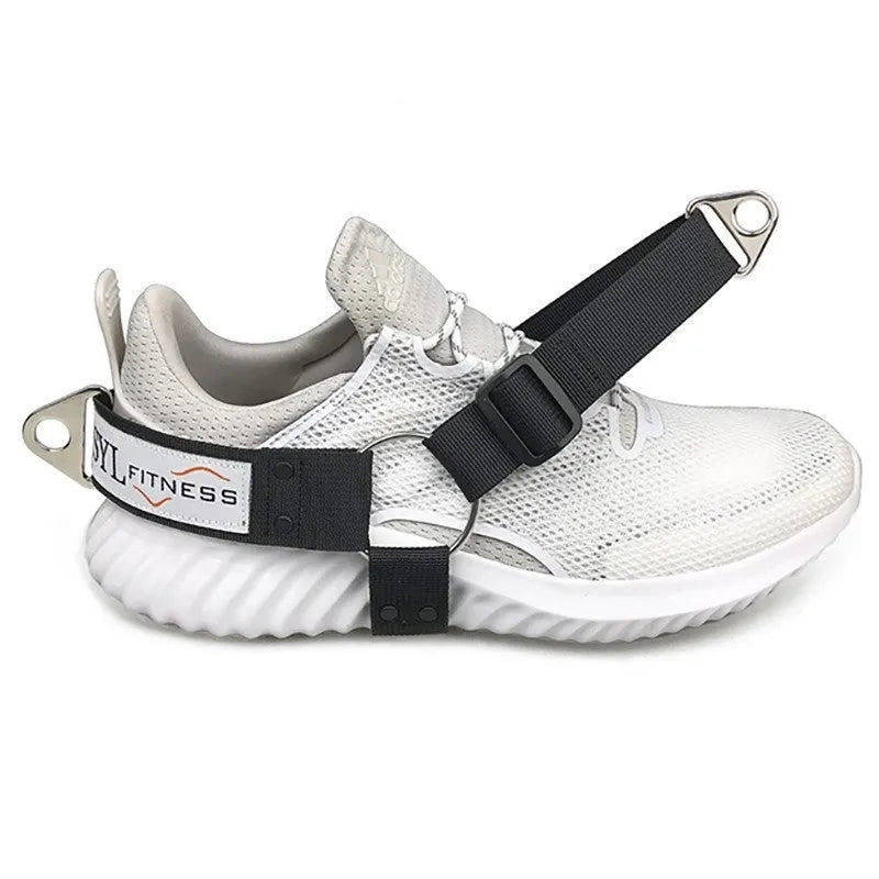 Black ankle strap with metal buckle for leg attachment in rope access or training