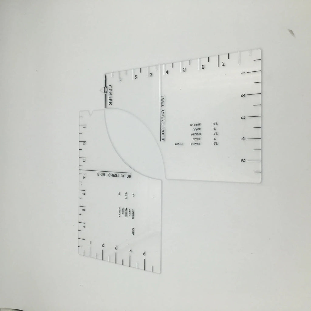 Clear acrylic sewing patch ruler for T-shirt alignment, 10 by 6 inches.