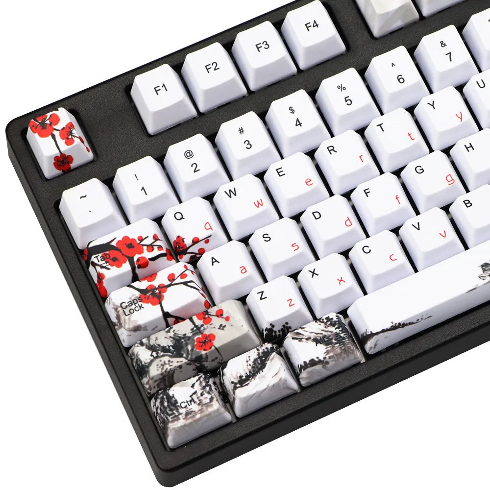 Set of 109 PBT keycaps with plum blossom design on a black background, showing Japanese legend style.