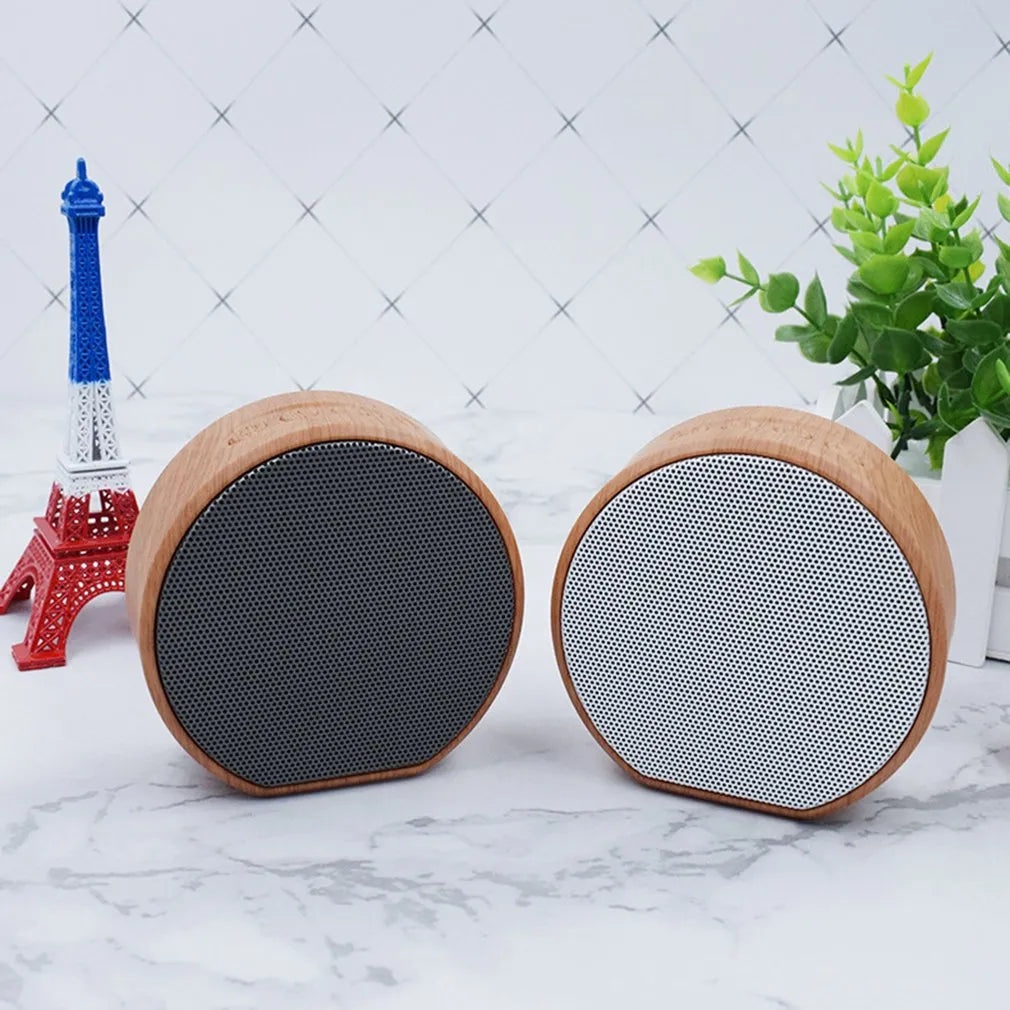A60 wood grain wireless Bluetooth speaker in black with wood finish, 83x80x34 mm, 3W speaker