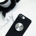 Ring phone stand in silicone and metal acting as a grip and stand for a mobile phone
