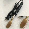 Black ABS wrinkle grinding and heating tool on a workbench
