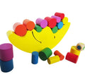 Moon-shaped wooden balance game with blue and yellow pieces for children aged 2-4 years