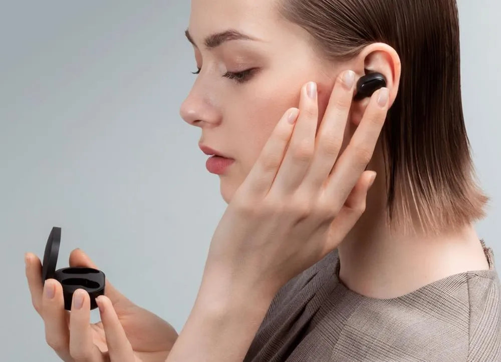 Redmi AirDots 2 black true wireless earbuds and charging case on a white background