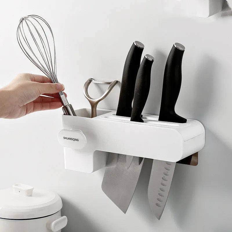 White plastic kitchen knife rack on countertop with dimensions 26 cm height