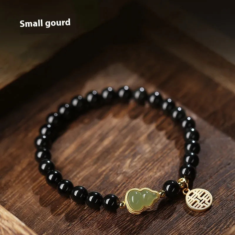 Black obsidian bracelet with Hetian jade gourd charm in 6mm, 8mm, or 10mm bead sizes